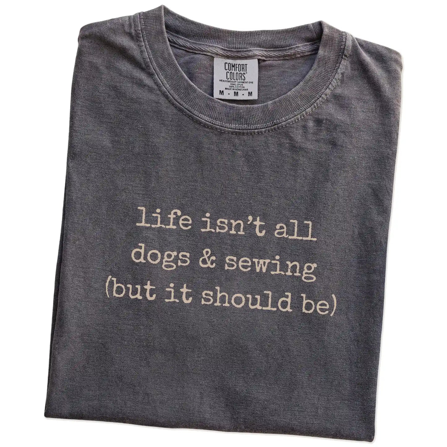 Folded Pepper Comfort Colors® T-shirt showing dog-themed sewing graphic
