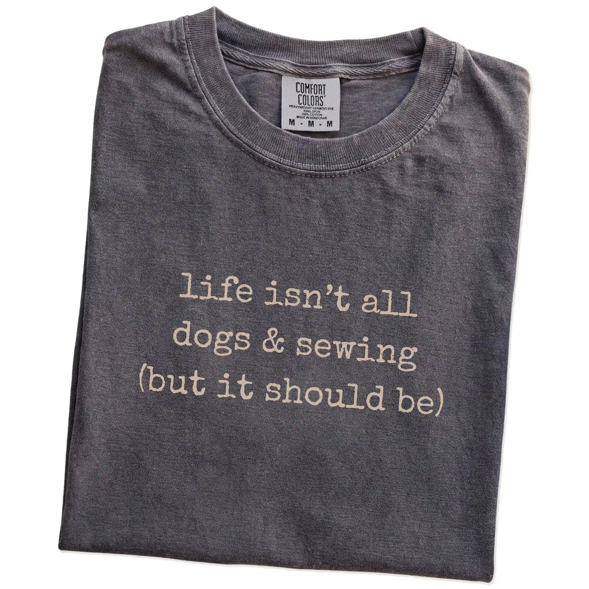 Folded Pepper Comfort Colors® T-shirt showing dog-themed sewing graphic