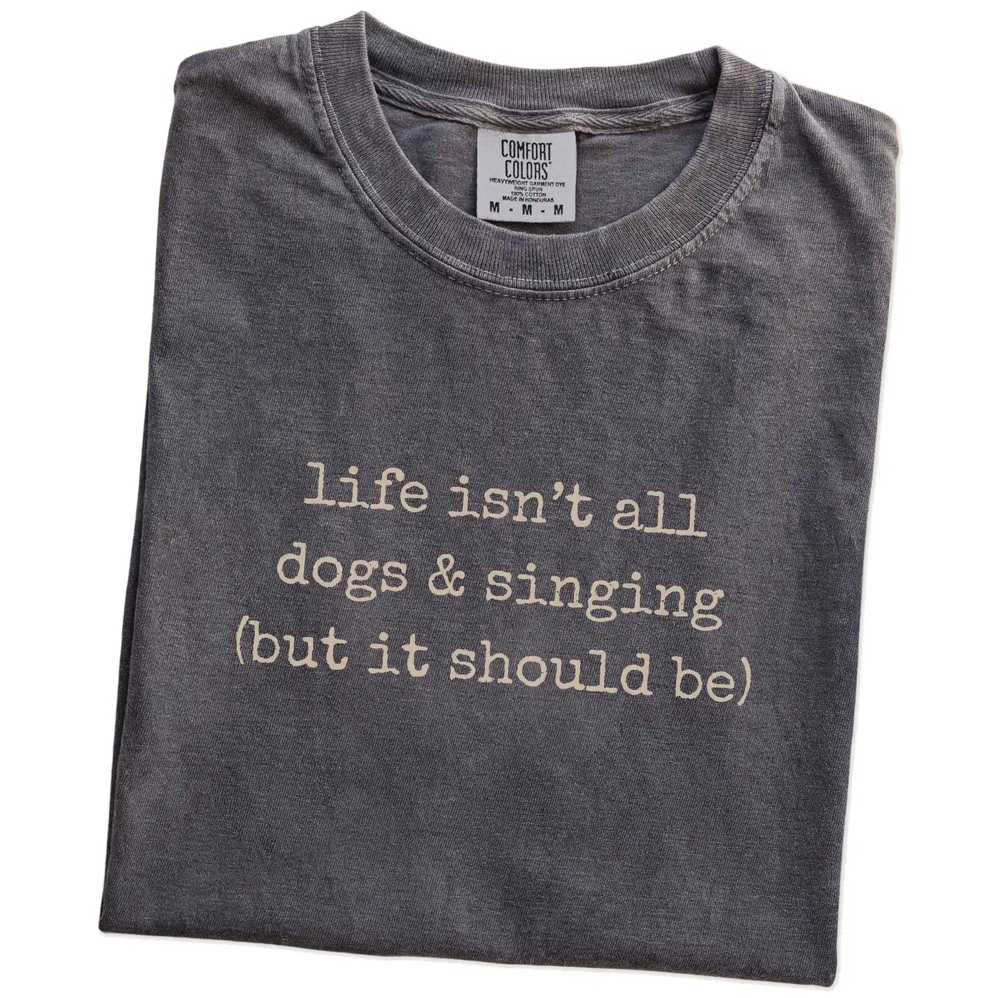 Folded Pepper Comfort Colors® T-shirt showing dog-themed singing graphic