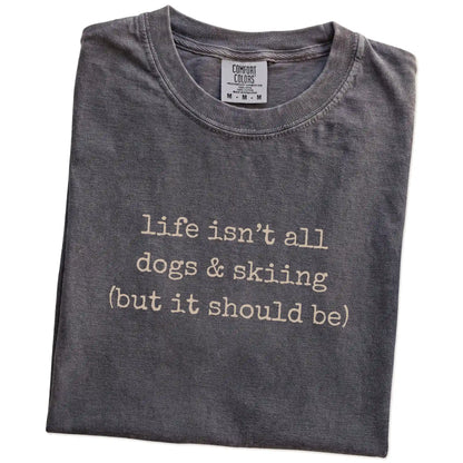 Folded Pepper Comfort Colors® T-shirt showing dog-themed skiing graphic