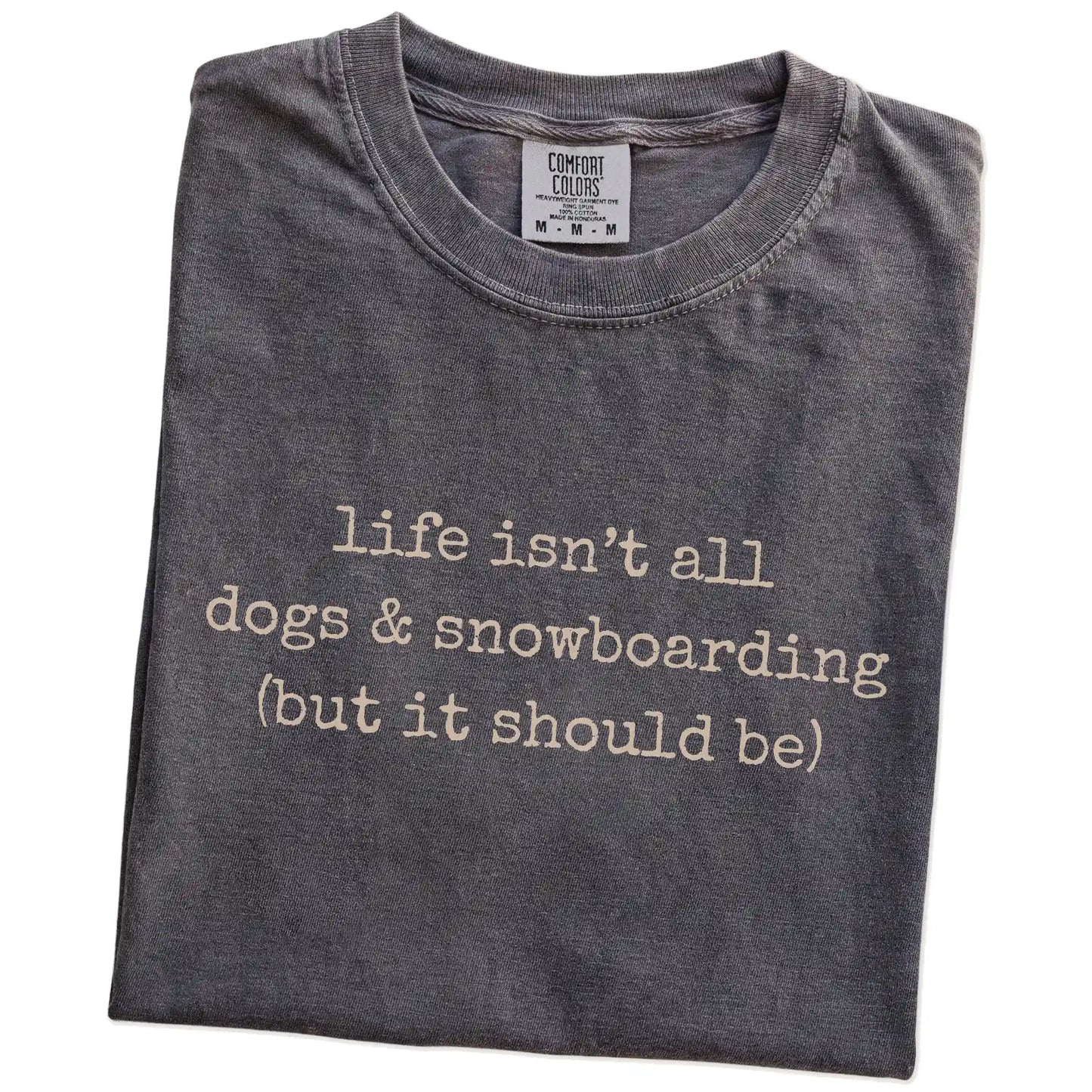 Folded Pepper Comfort Colors® T-shirt showing dog-themed snowboarding graphic