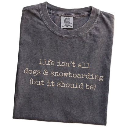 Folded Pepper Comfort Colors® T-shirt showing dog-themed snowboarding graphic
