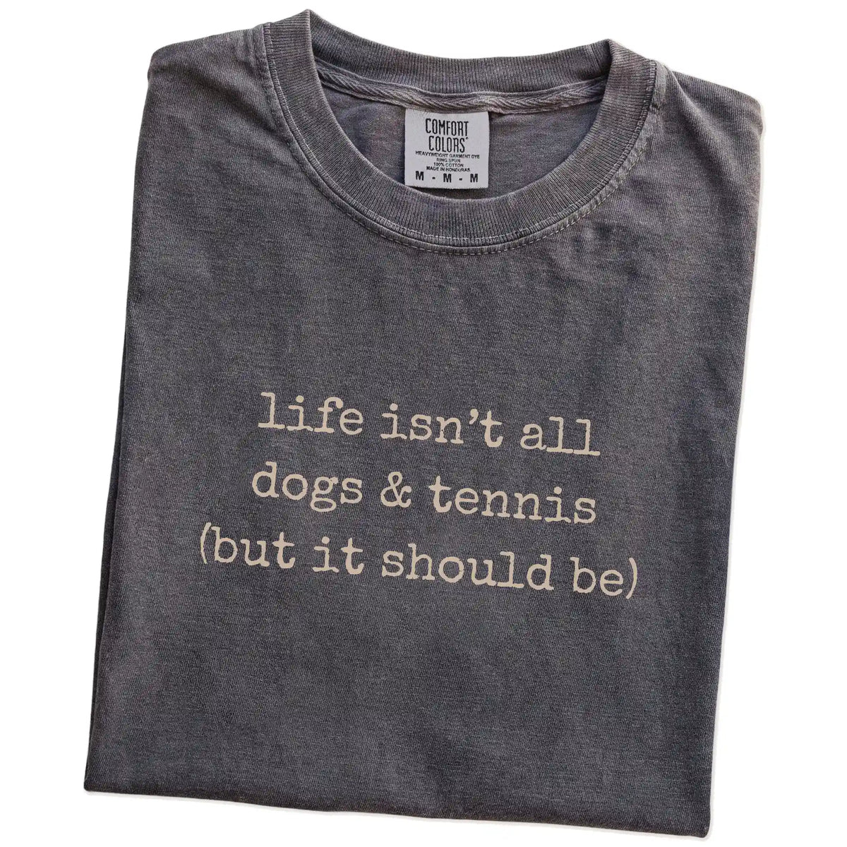 Folded Pepper Comfort Colors® T-shirt showing dog-themed tennis graphic
