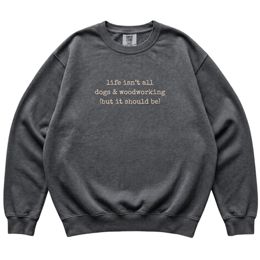 Pepper Dogs and Woodworking Comfort Colors sweatshirt laid flat