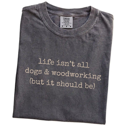 Folded Pepper Comfort Colors® T-shirt showing dog-themed woodworking graphic