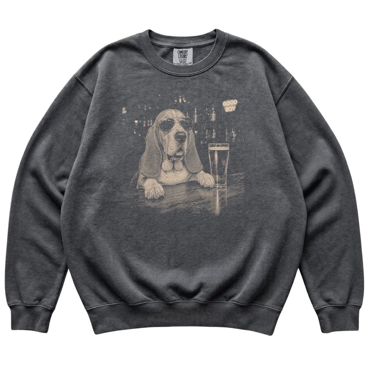 Pepper Basset Hound at a bar beside a pint, laid flat