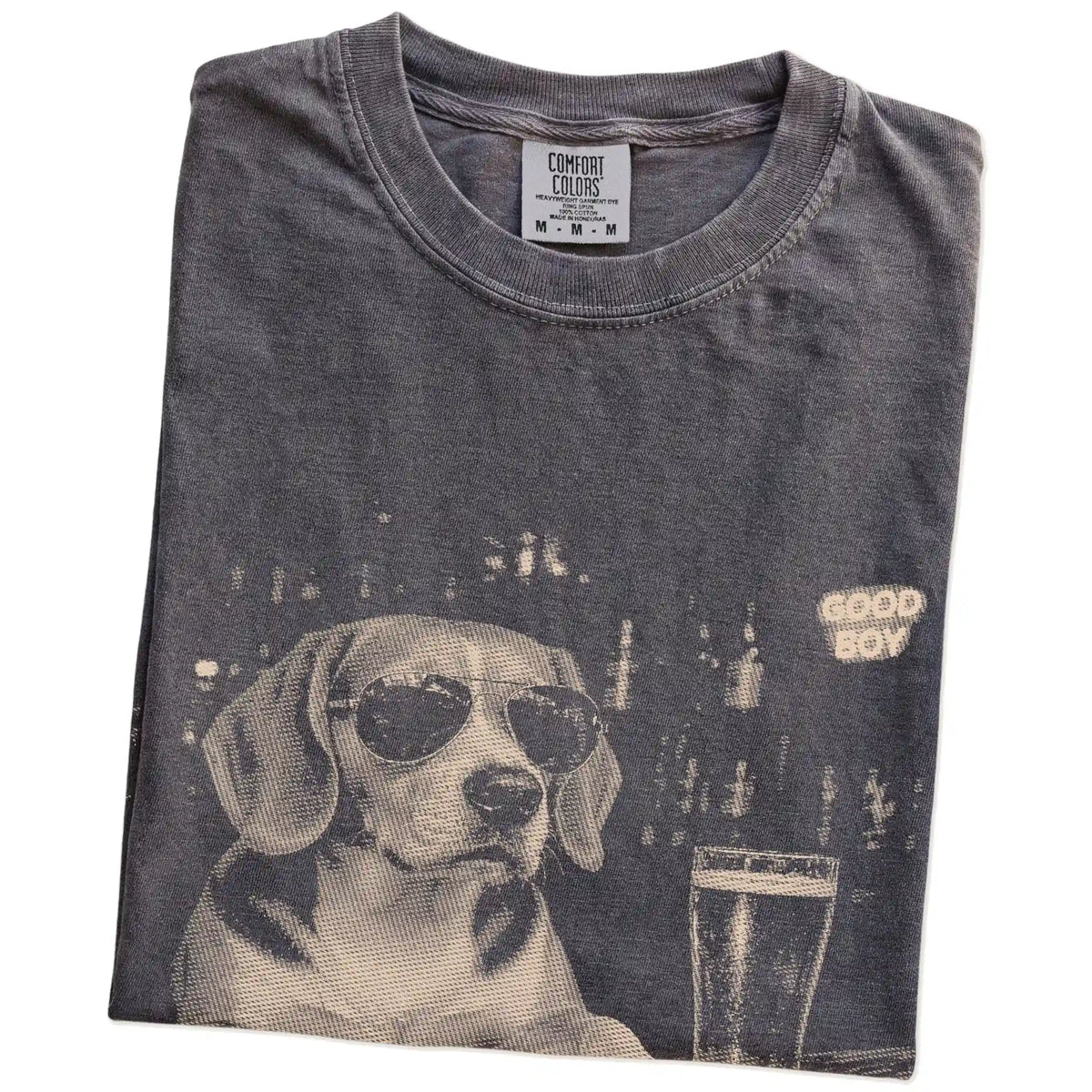 Pepper Beagle at a bar beside a pint, folded detail view