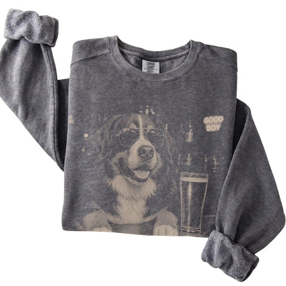 Pepper Bernese Mountain Dog at a bar beside a pint, folded detail view