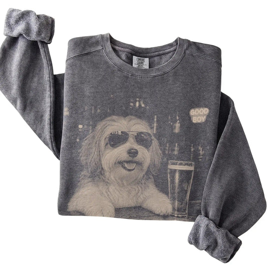 Pepper Havanese at a bar beside a pint, folded detail view