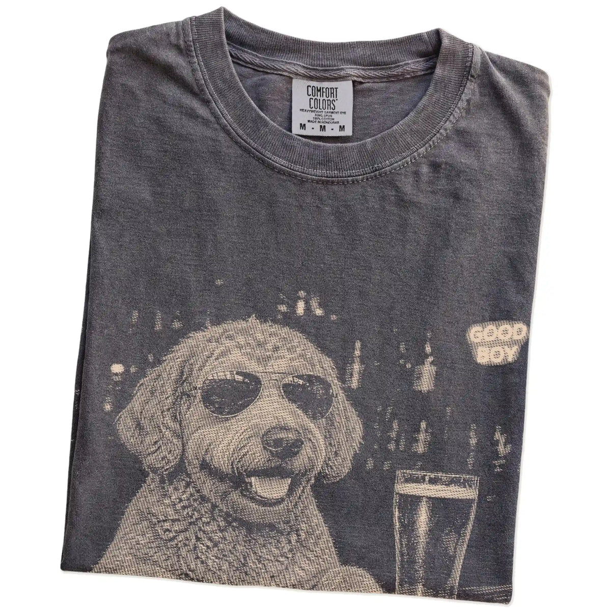 Pepper Labradoodle at a bar beside a pint, folded detail view