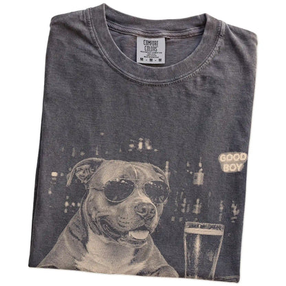 Pepper Pitbull at a bar beside a pint, folded detail view