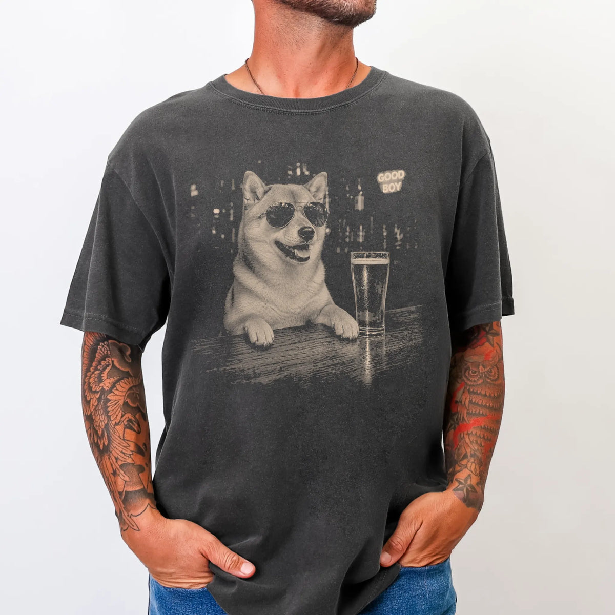 Pepper Shiba Inu at a bar beside a pint, worn in a studio setting