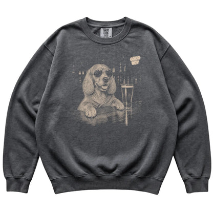 Pepper Springer Spaniel at a bar beside a pint, laid flat