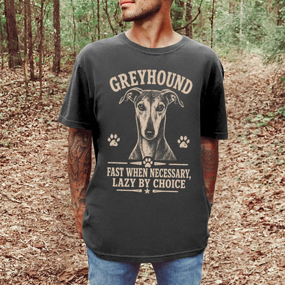 Model wearing a Pepper Comfort Colors® T-shirt featuring Greyhound design with “Fast When Necessary, Lazy By Choice” letterin