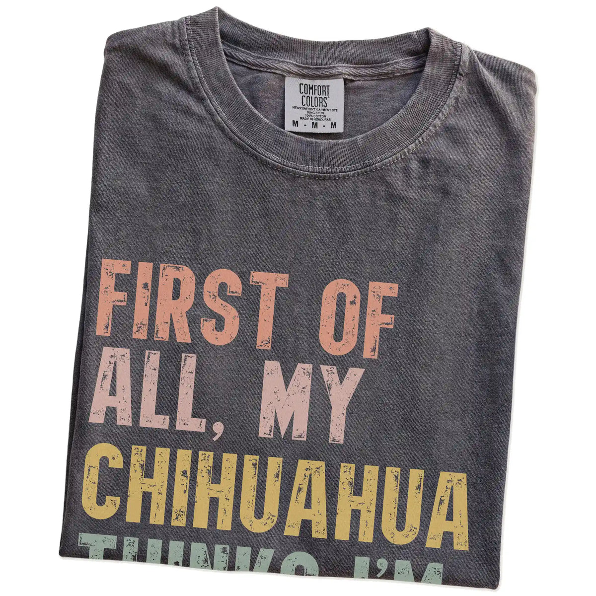 Folded Pepper Comfort Colors® T-shirt showing “My Chihuahua thinks I’m delightful” text