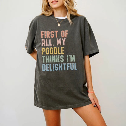 Model wearing a Pepper Comfort Colors® T-shirt with “My Poodle thinks I’m delightful” text