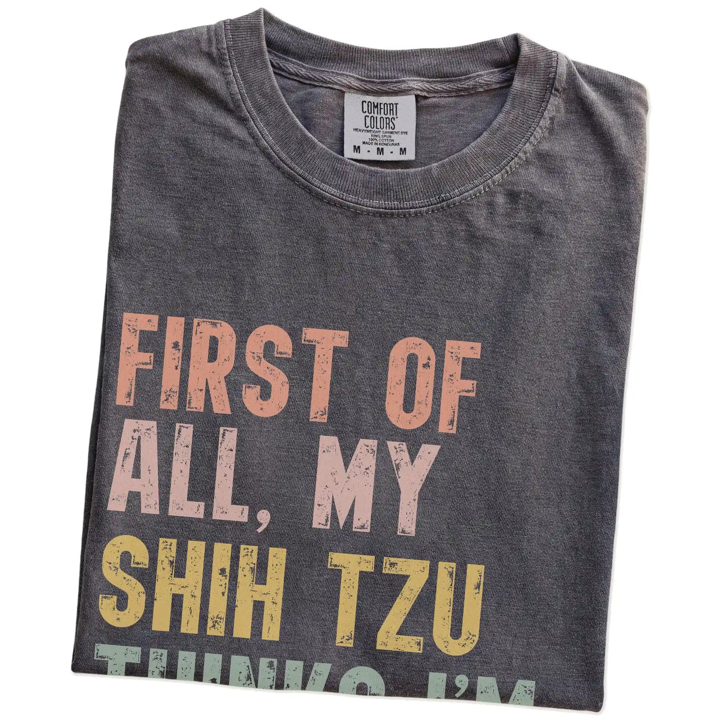 Folded Pepper Comfort Colors® T-shirt showing “My Shih Tzu thinks I’m delightful” text
