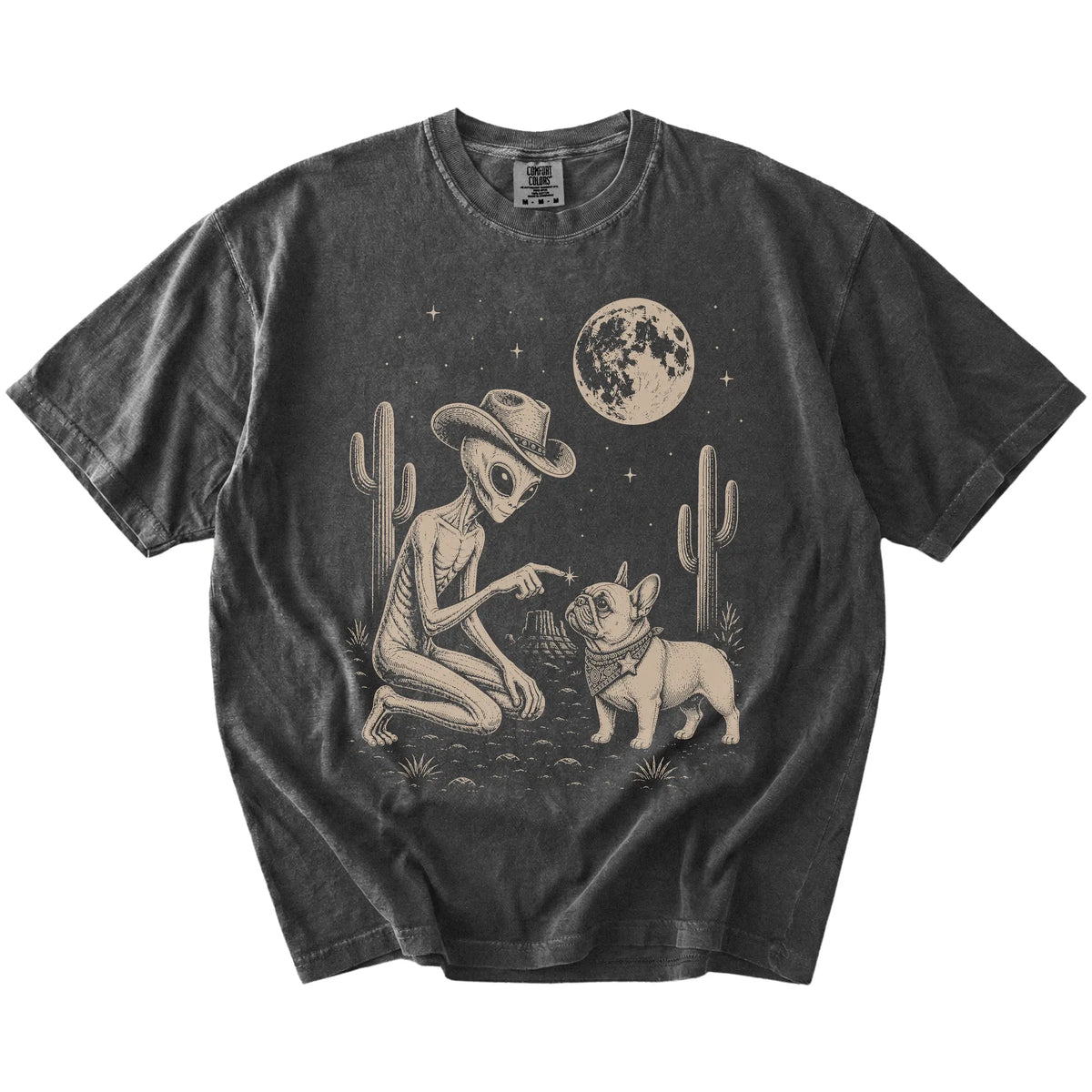 Cowboy alien fist-bumping a French Bulldog beneath the moon on a Pepper Comfort Colors® T-shirt