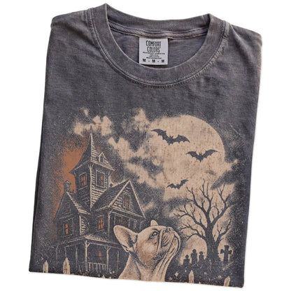 Folded Pepper Comfort Colors® T-shirt showing French Bulldog in a vintage haunted-house scene
