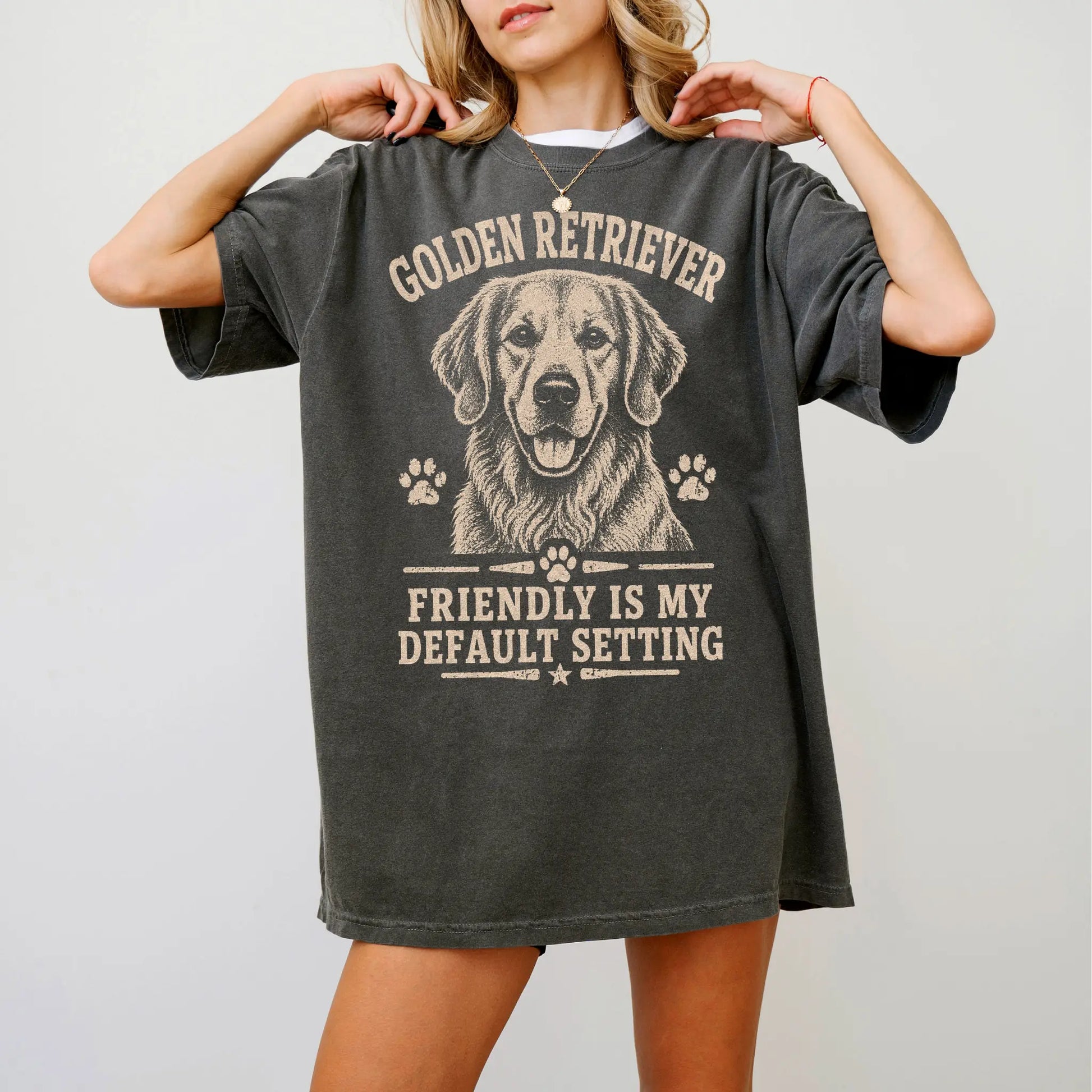 Model wearing a Pepper Comfort Colors® T-shirt featuring Golden Retriever design with “Friendly Is My Default Setting” letter