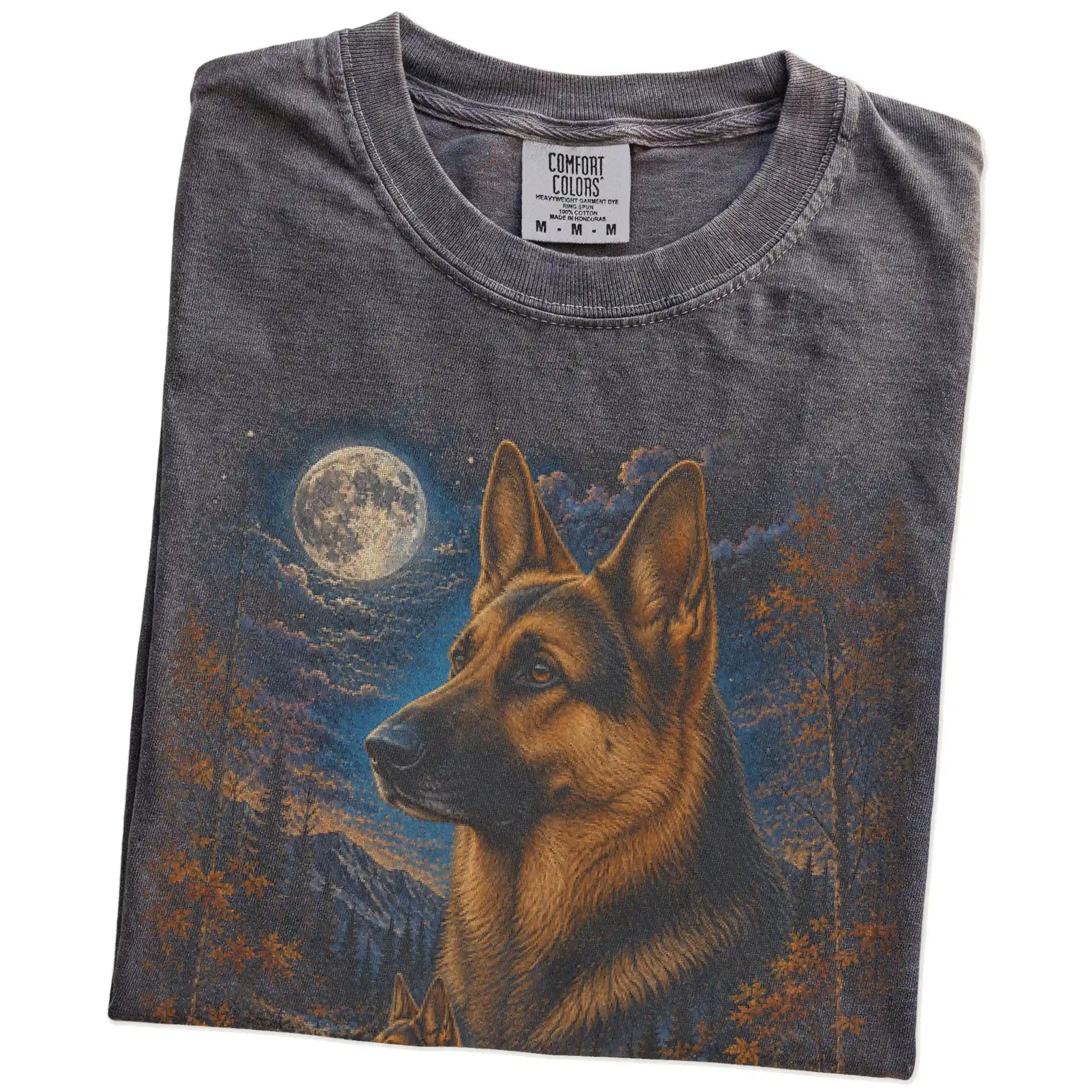 Folded Pepper Comfort Colors® t-shirt showing German Shepherd in a fall forest graphic