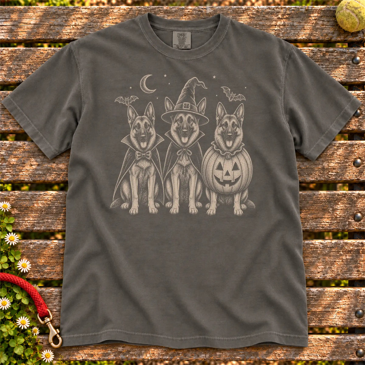 Three German Shepherd dogs dressed for Halloween beneath bats and a crescent moon on a Pepper Comfort Colors® T-shirt