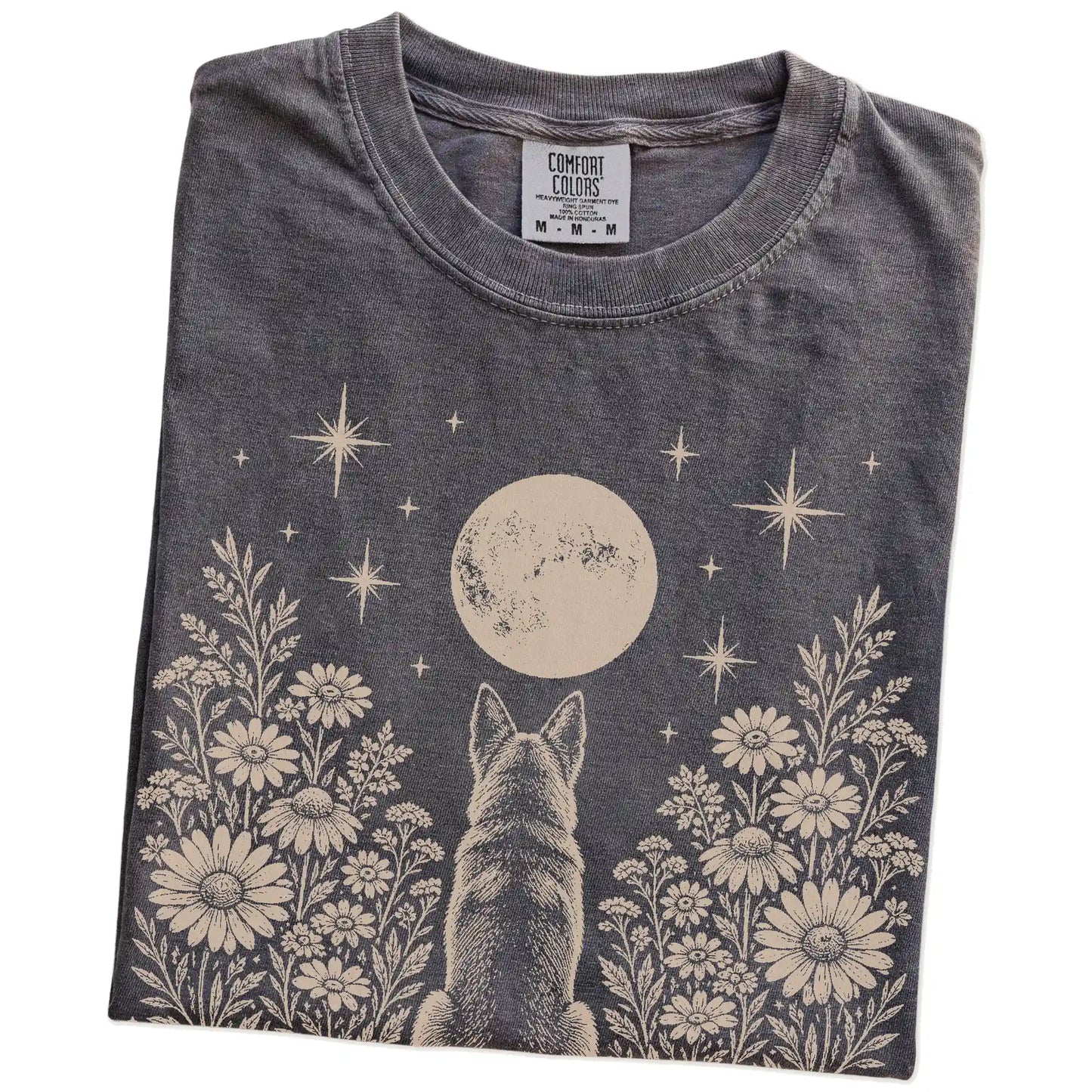 Folded Pepper Comfort Colors® T-shirt showing German Shepherd beneath a wildflower moon