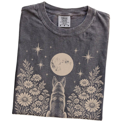 Folded Pepper Comfort Colors® T-shirt showing German Shepherd beneath a wildflower moon