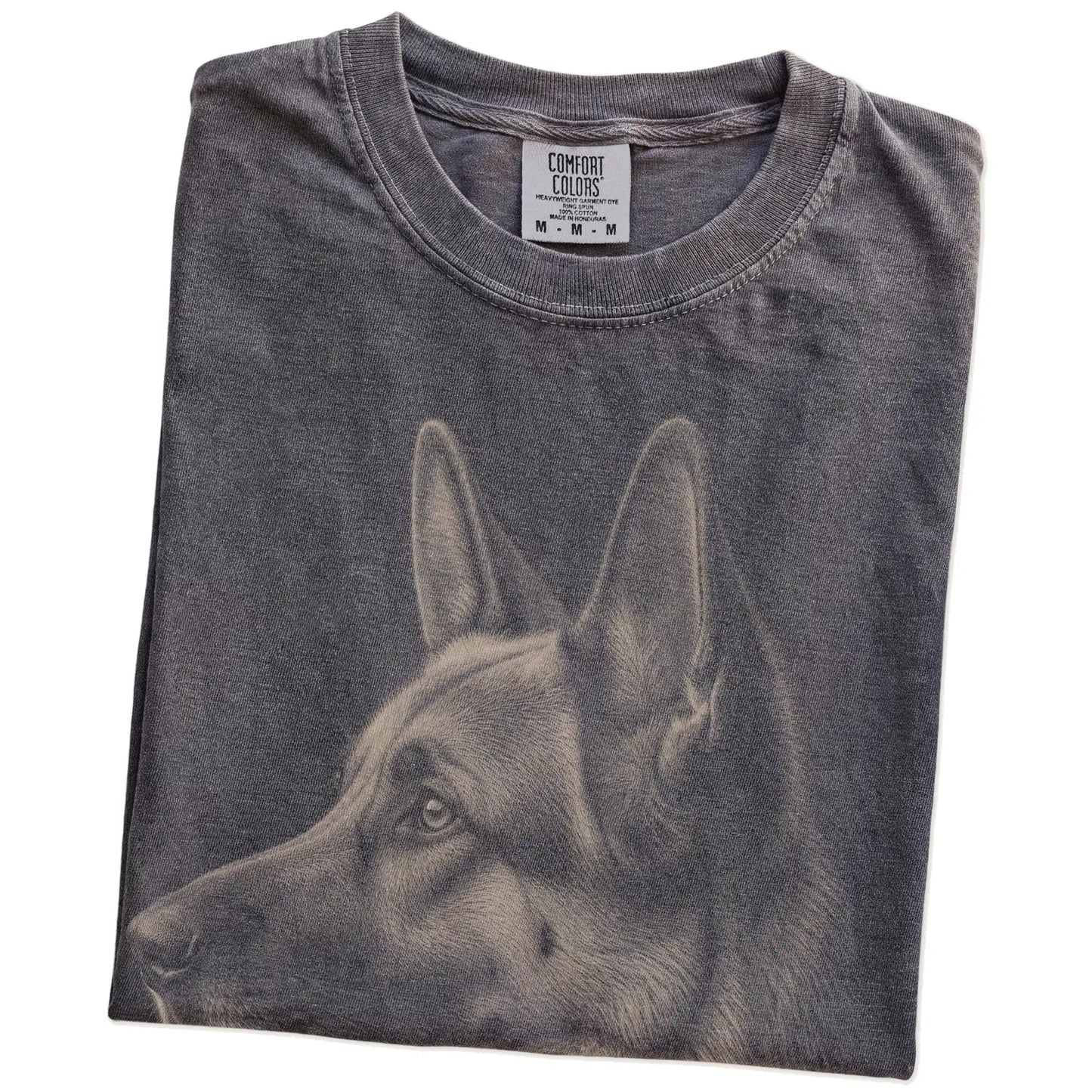 Folded Pepper Comfort Colors® T-shirt showing a detailed photographic portrait of a German Shepherd