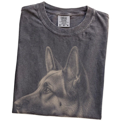 Folded Pepper Comfort Colors® T-shirt showing a detailed photographic portrait of a German Shepherd