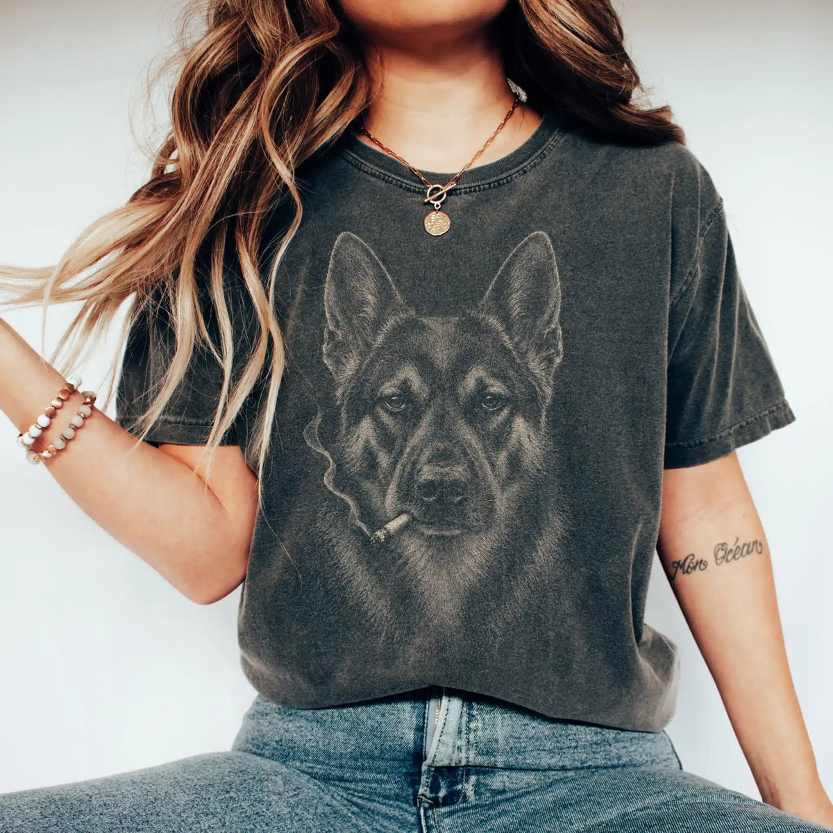 Model wearing a German Shepherd smoking design on a Pepper t-shirt