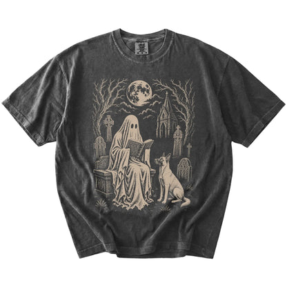 Belgian Malinois beside a reading ghost in a moonlit graveyard on a Pepper Comfort Colors® T-shirt