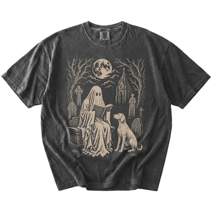 Weimaraner beside a reading ghost in a moonlit graveyard on a Pepper Comfort Colors® T-shirt