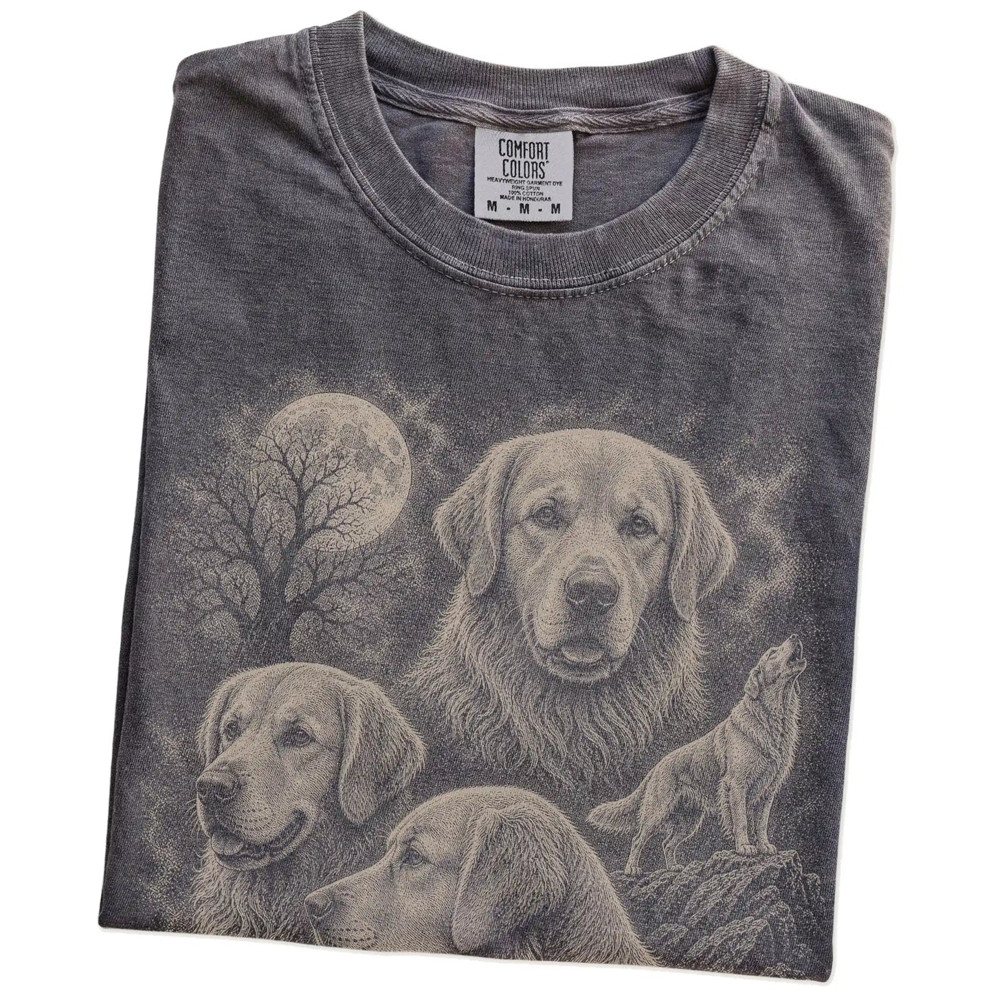 Folded Pepper Comfort Colors® T-shirt showing a vintage moon montage featuring Golden Retriever