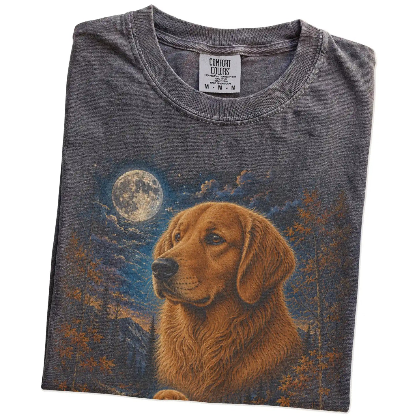 Folded Pepper Comfort Colors® t-shirt showing Golden Retriever in a fall forest graphic