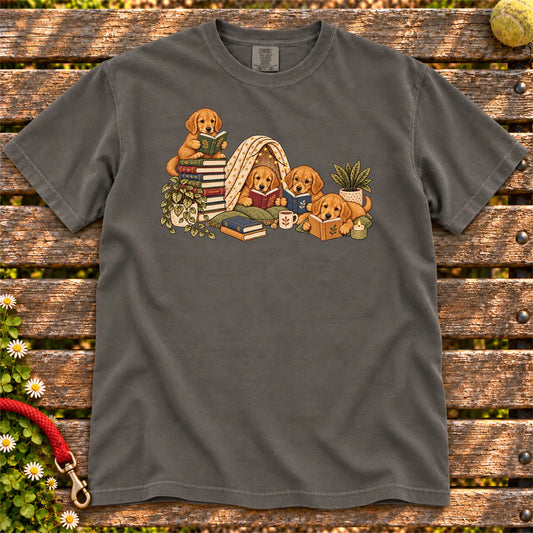 Golden Retriever puppies reading books in a cozy blanket fort on a Pepper T-shirt