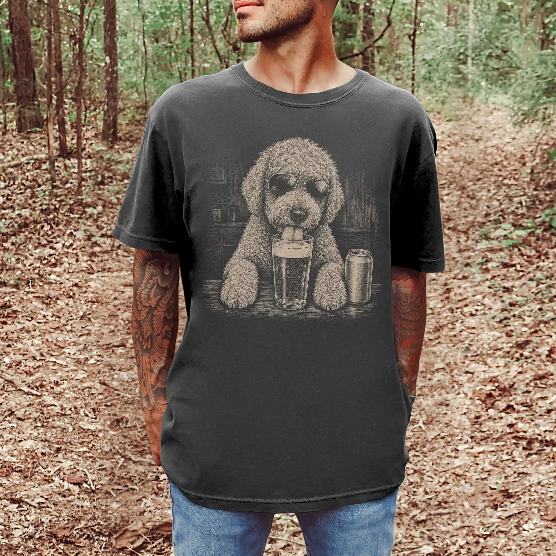 Model wearing a Pepper Comfort Colors® t-shirt with Goldendoodle sneaking a drink from a pint