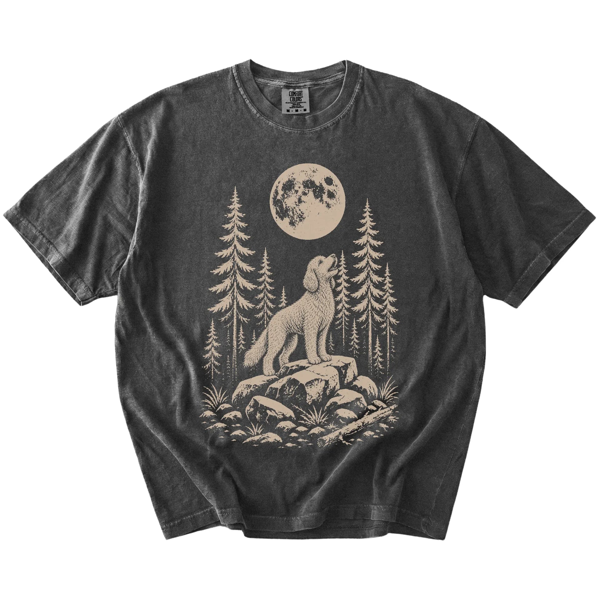 Goldendoodle howling beneath the moon and pine trees on a Pepper Comfort Colors® T-shirt