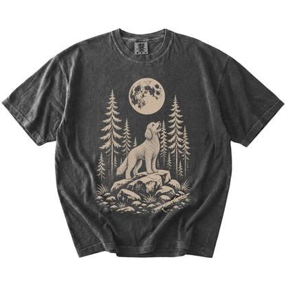 Goldendoodle howling beneath the moon and pine trees on a Pepper Comfort Colors® T-shirt
