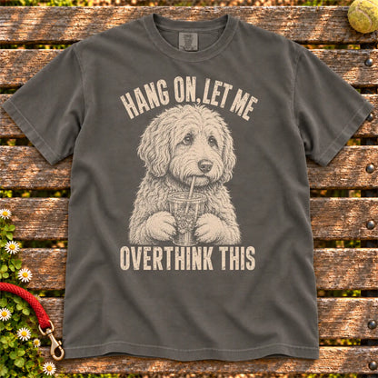 Overthinking Goldendoodle design on a Pepper Comfort Colors T-shirt, shown flat