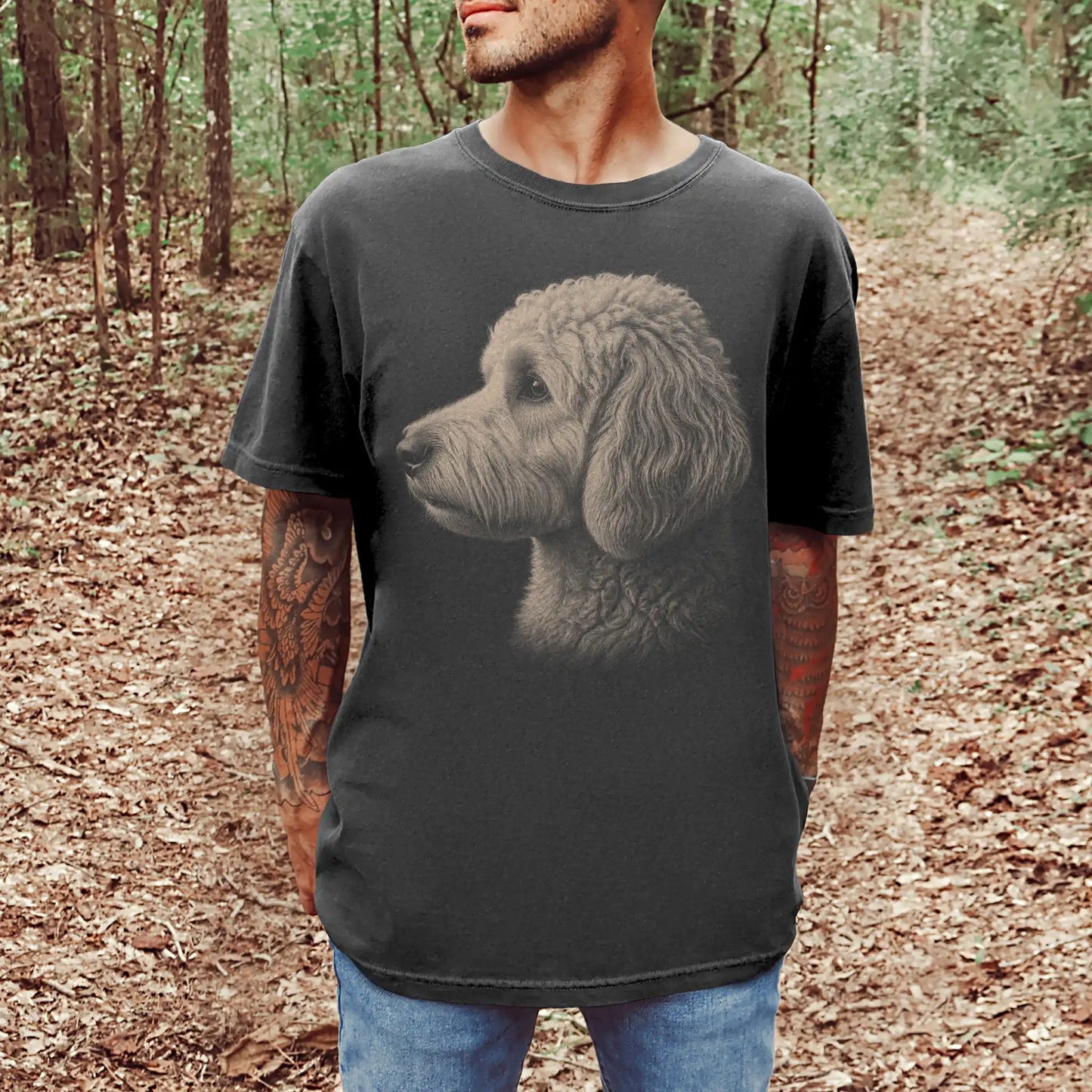 Model wearing a Pepper Comfort Colors® T-shirt with a detailed photographic portrait of a Goldendoodle