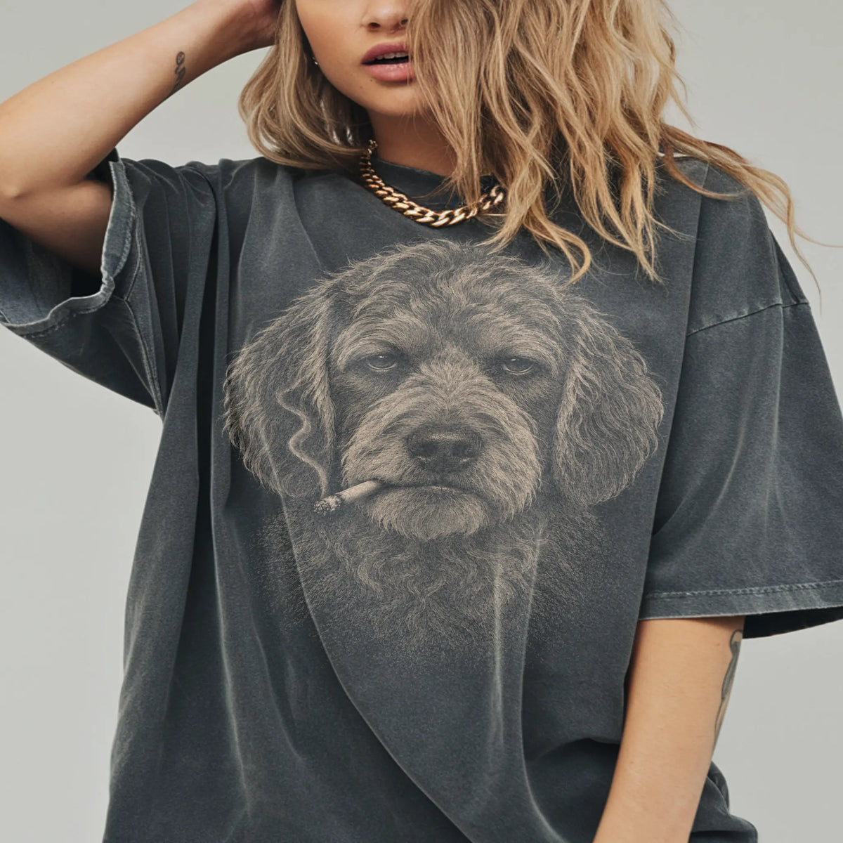 Model wearing a Goldendoodle smoking design on a Pepper t-shirt