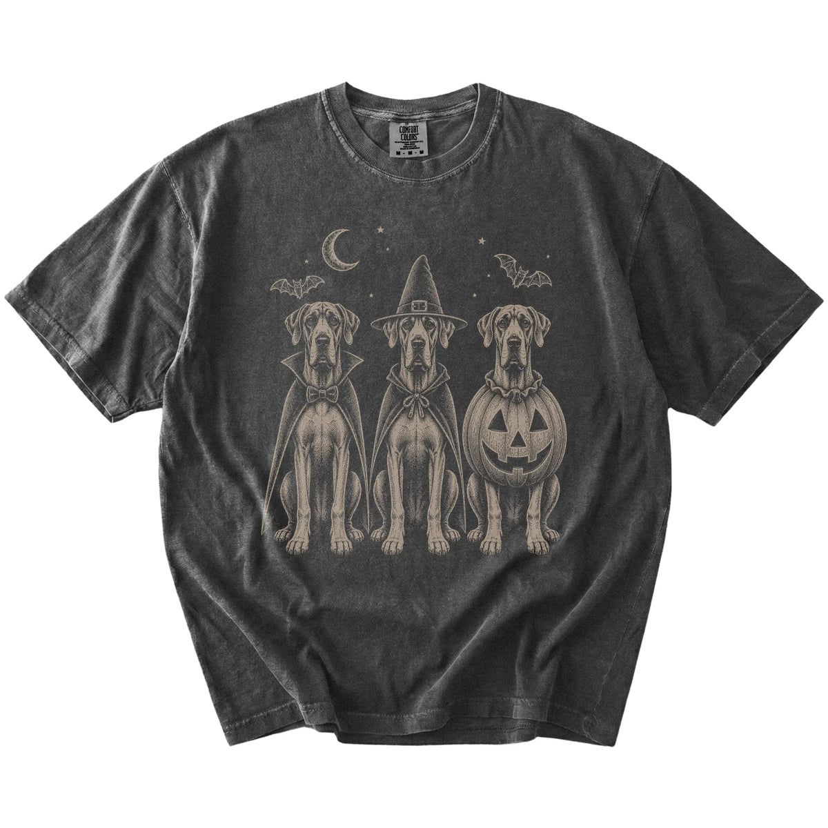 Three Great Dane dogs dressed for Halloween beneath bats and a crescent moon on a Pepper Comfort Colors® T-shirt
