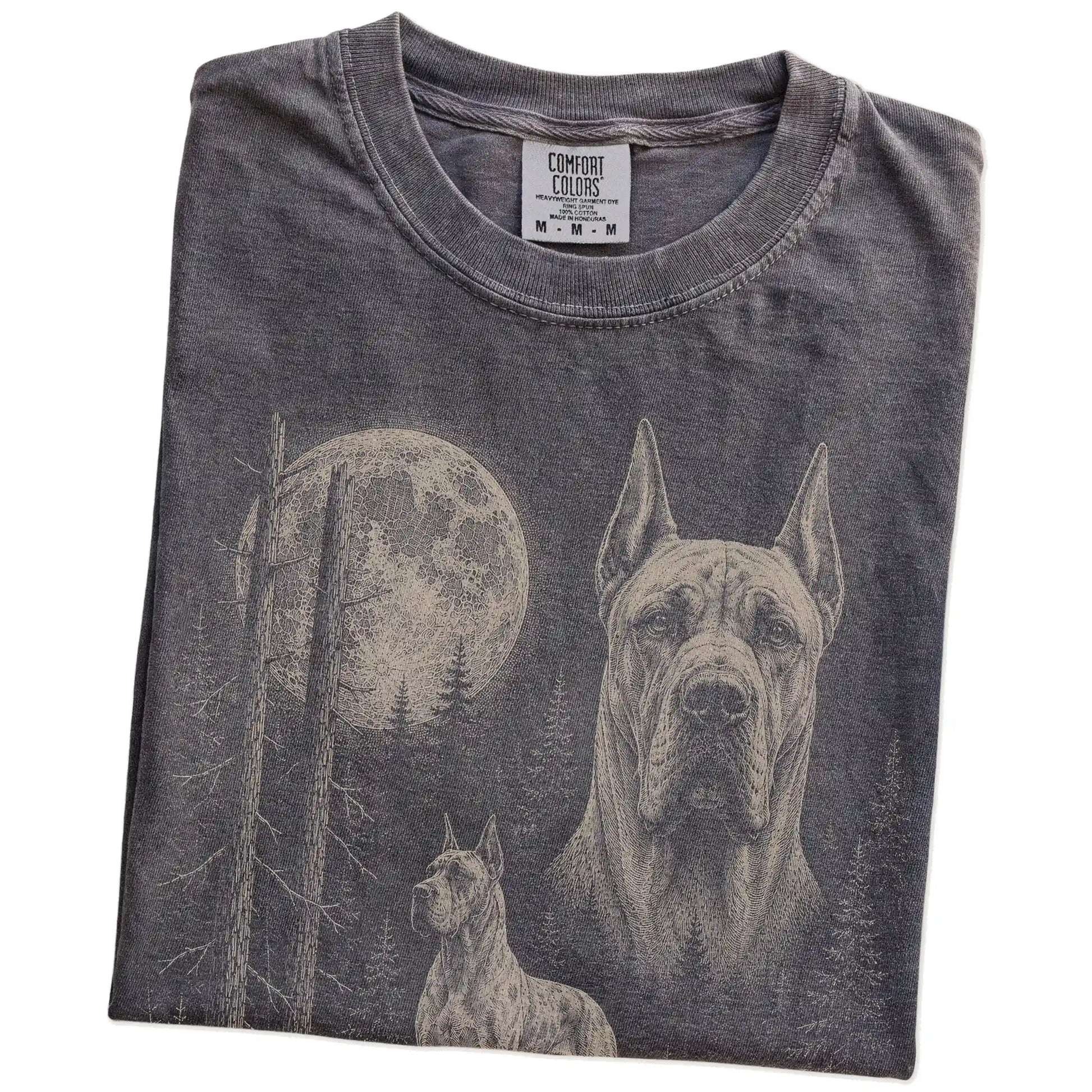 Folded Pepper Great Dane Moonlit Forest T-Shirt showing the graphic