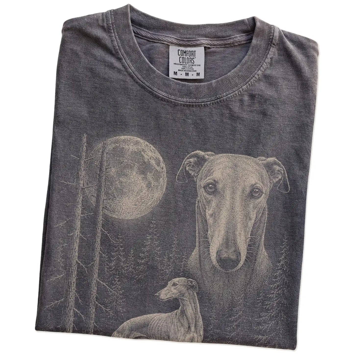 Folded Pepper Greyhound Moonlit Forest T-Shirt showing the graphic