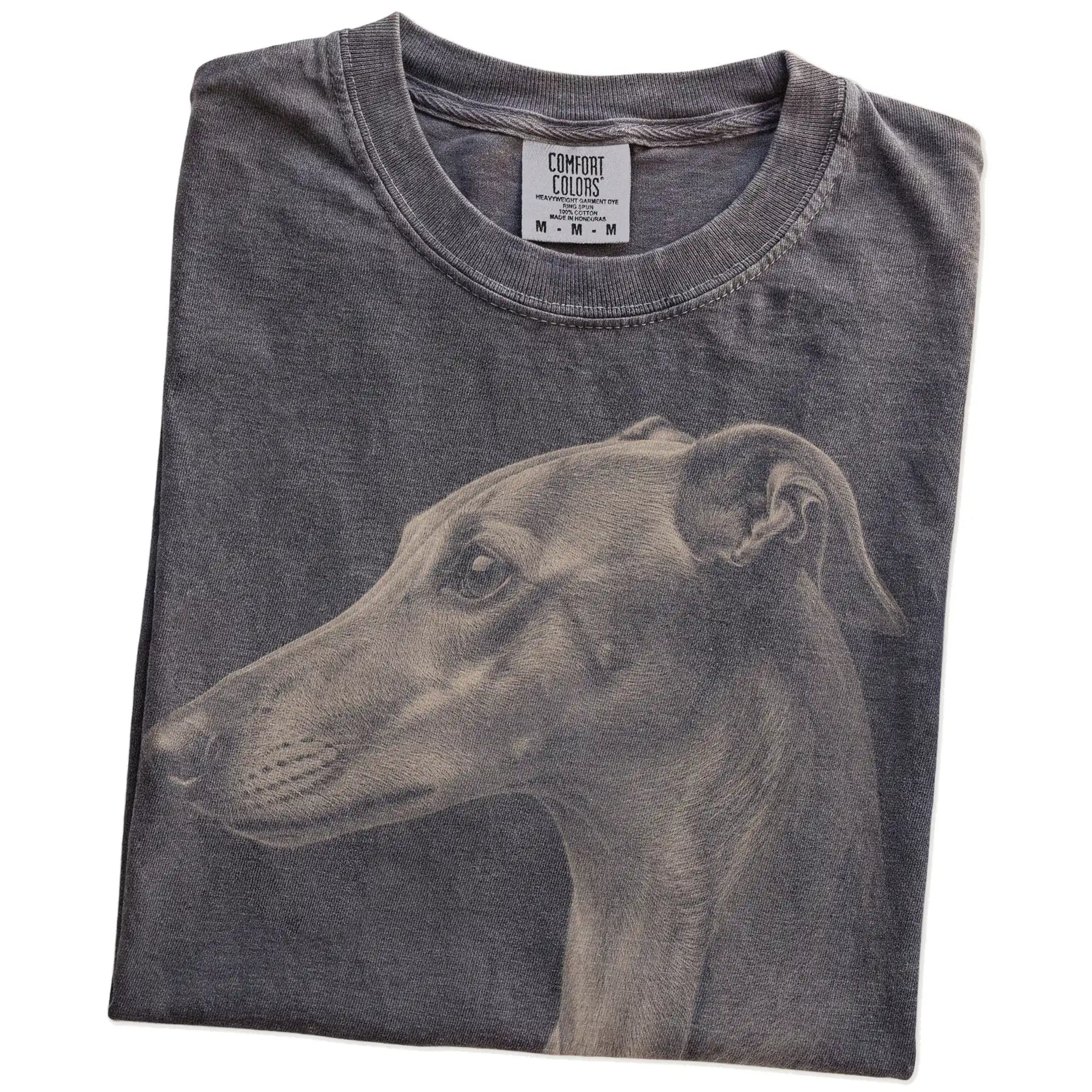Folded Pepper Comfort Colors® T-shirt showing a detailed photographic portrait of a Greyhound