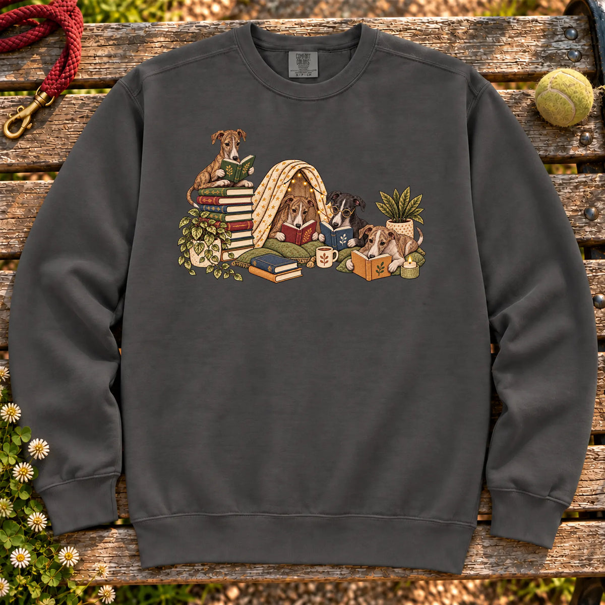 Greyhound puppies reading books in a cozy blanket fort on a Pepper sweatshirt