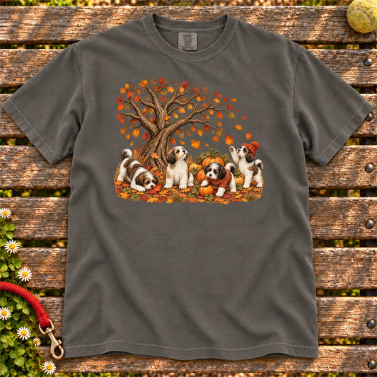 Four Havanese puppies with pumpkins beneath an autumn tree on a Pepper garment-dyed T-shirt