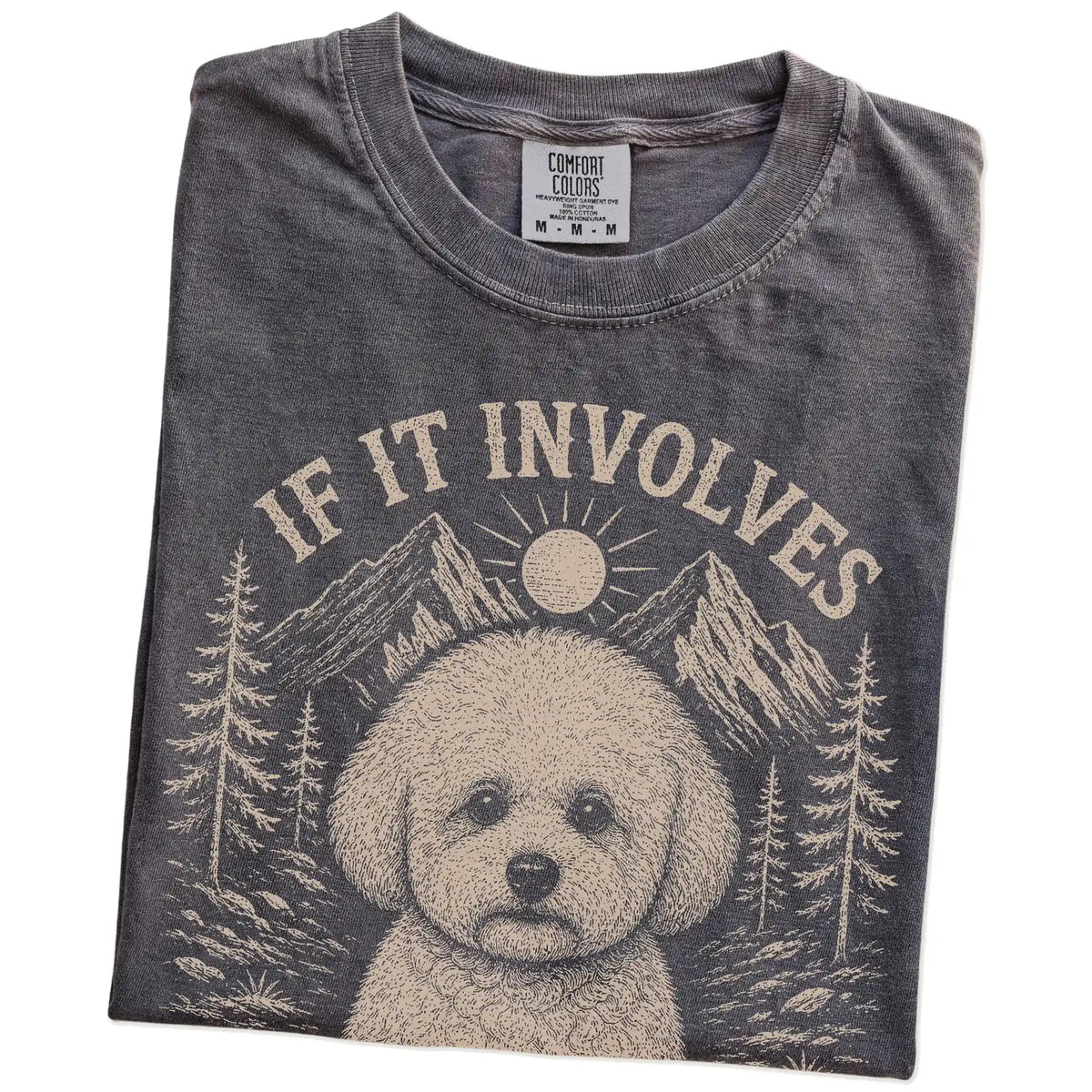 Folded Pepper Comfort Colors® T-shirt showing Bichon Frise hiking design with mountain scenery