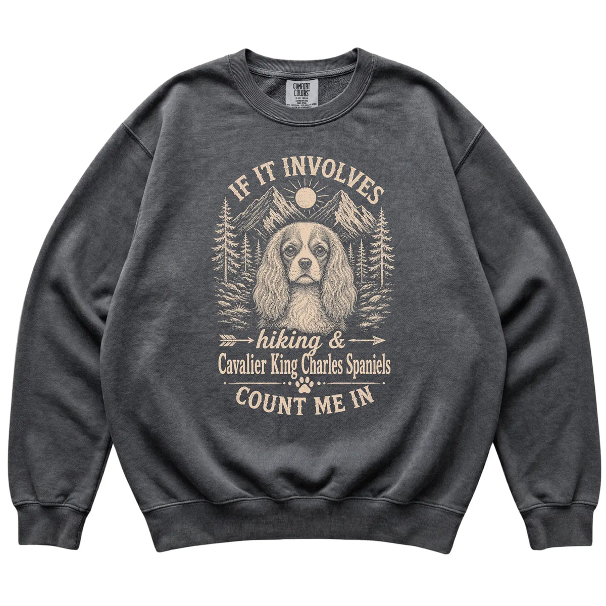 Pepper Comfort Colors® sweatshirt featuring Hiking and Cavalier King Charles Spaniels, laid-flat presentation